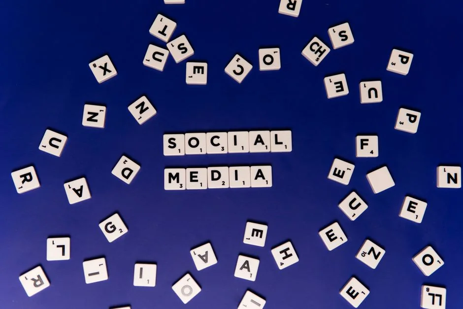 heros-img Close-in view of a social media marketing document resting on a desk beside a pen and notebook.